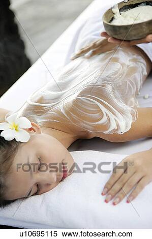 View of cream applied on a teenage girl’s back. View Large Photo Image Stock Photography - View of cream applied on a teenage girl’s back.. Fotosearch