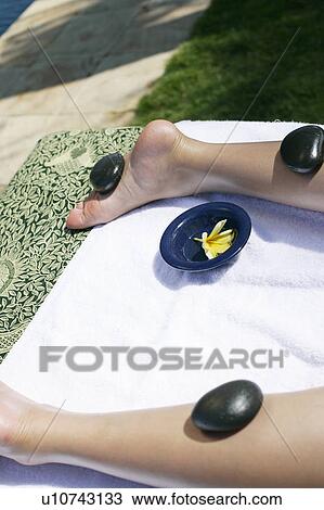 View of stones on a female’s legs. View Large Photo Image Stock Image - View of stones on a female’s legs.. Fotosearch