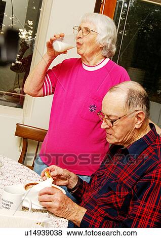 An elderly couple at the breakfast table. View Large Photo Image Stock Photo - An elderly couple at the breakfast table.. Fotosearch