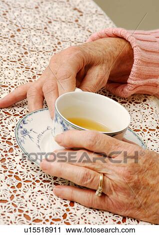 Stock Image - Close-up of tea served in a cup.. Fotosearch