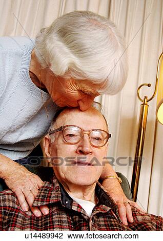 Front view of a loving and affectionate couple. View Large Photo Image Stock Image - Front view of a loving and affectionate couple.. Fotosearch