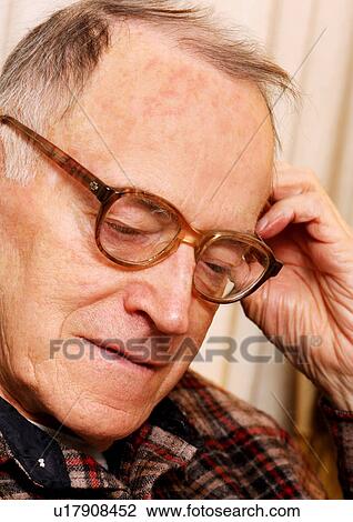 Portrait of an elderly man in deep thoughts. View Large Photo Image Stock Image - Portrait of an elderly man in deep thoughts.. Fotosearch