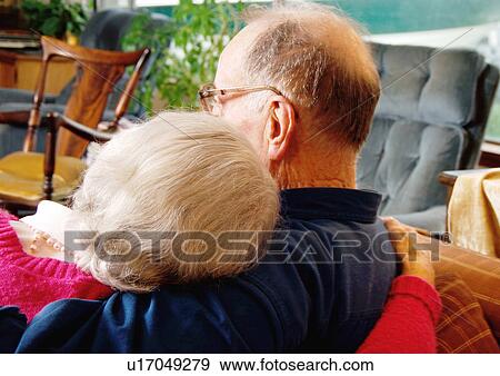 Stock Photo - Rear view of an elderly couple.. Fotosearch