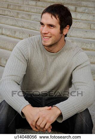 Portrait of a cheerful young man. View Large Photo Image Stock Photograph - Portrait of a cheerful young man.. Fotosearch