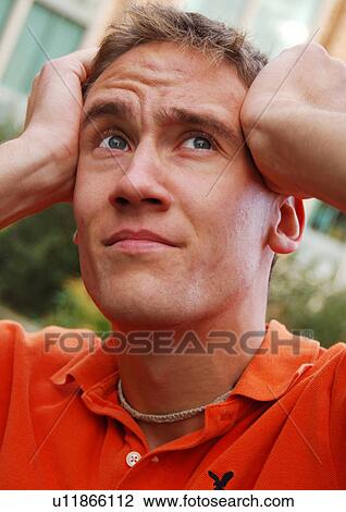 Portrait of a frustrated young man. View Large Photo Image Stock Image - Portrait of a frustrated young man.. Fotosearch