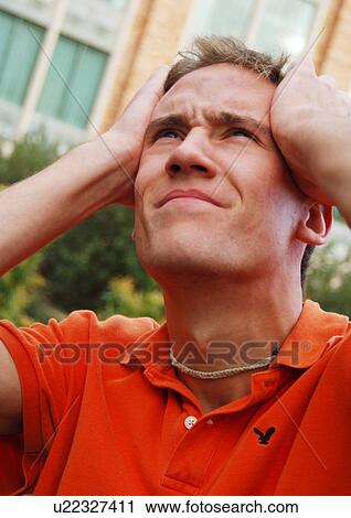 Portrait of a frustrated young man. View Large Photo Image Stock Image - Portrait of a frustrated young man.. Fotosearch