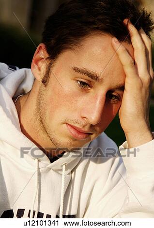 Portrait of a pensive man. View Large Photo Image Stock Image - Portrait of a pensive man.. Fotosearch