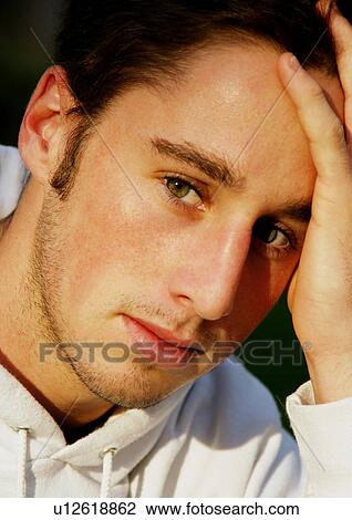 Portrait of a pensive man. View Large Photo Image Stock Image - Portrait of a pensive man.. Fotosearch