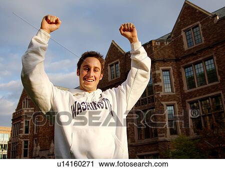 Stock Image - Portrait of an elated young man.. Fotosearch