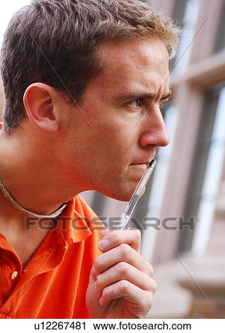 Profile of a thoughtful young man. View Large Photo Image Stock Image - Profile of a thoughtful young man.. Fotosearch