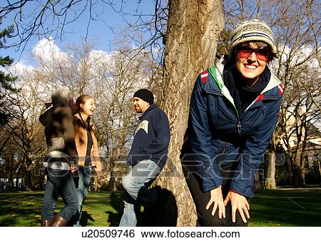 View of a cheerful woman on a holiday. View Large Photo Image Stock Photograph - View of a cheerful woman on a holiday.. Fotosearch