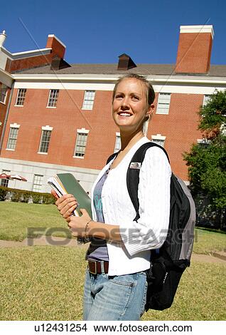 Profile of a cheerful young woman. View Large Photo Image Picture - Profile of a cheerful young woman.. Fotosearch
