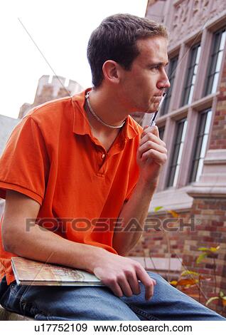 Profile of a thoughtful young man. View Large Photo Image Stock Photo - Profile of a thoughtful young man.. Fotosearch