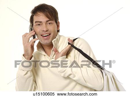 Portrait of a man talking on a cellphone. View Large Photo Image Stock Photography - Portrait of a man talking on a cellphone.. Fotosearch