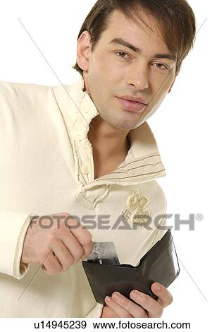Portrait of a young man ready with his wallet. View Large Photo Image Stock Photo - Portrait of a young man ready with his wallet.. Fotosearch
