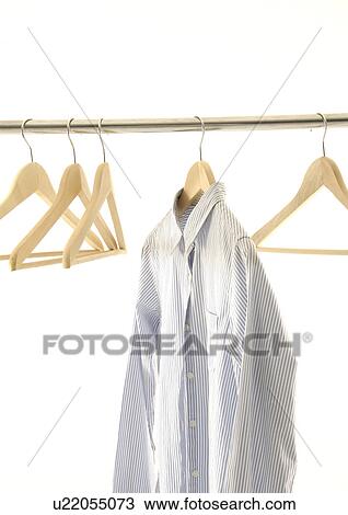View of a shirt on a hanger. View Large Photo Image Stock Image - View of a shirt on a hanger.. Fotosearch