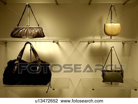 View of purses displayed in a shop. View Large Photo Image Stock Image - View of purses displayed in a shop.. Fotosearch