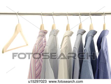 View of shirts displayed on a rod. View Large Photo Image Stock Image - View of shirts displayed on a rod.. Fotosearch