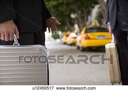 A Pair of Businessman on the Street, Close Up, Side View, Differential Focus View Large Photo Image Stock Photo - A Pair of Businessman on the Street, Close Up, Side View, Differential Focus. Fotosearch
