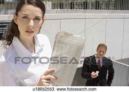 Stock Image - A Pair of Office Workers, Front View, Waist Up. Fotosearch