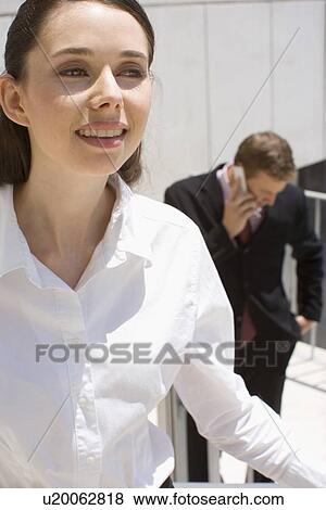A Pair of Office Workers, Front View, Waist Up View Large Photo Image Stock Photo - A Pair of Office Workers, Front View, Waist Up. Fotosearch