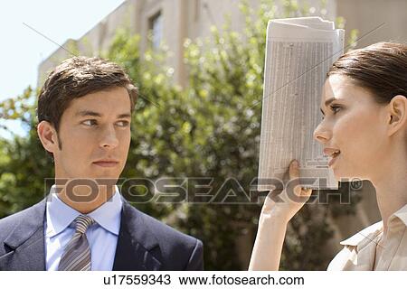 A Pair of Talking Office Workers, Head and Shoulders, Front View, Side View, Differential Focus View Large Photo Image Stock Image - A Pair of Talking Office Workers, Head and Shoulders, Front View, Side View, Differential Focus. Fotosearch