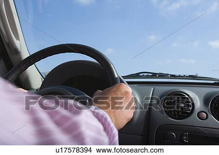 Closed Up Image of Hands Holding a Steering Wheel View Large Photo Image Picture - Closed Up Image of Hands Holding a Steering Wheel. Fotosearch