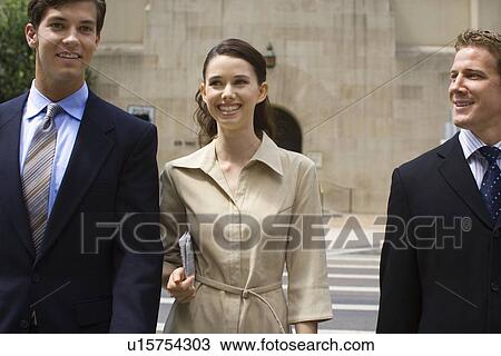 Three Office Workers Crossing the Road, Front View, Waist Up View Large Photo Image Stock Image - Three Office Workers Crossing the Road, Front View, Waist Up. Fotosearch