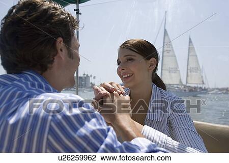 Young adult couple on a cruiser, Rear View, Side View, Differential Focus View Large Photo Image Stock Image - Young adult couple on a cruiser, Rear View, Side View, Differential Focus. Fotosearch