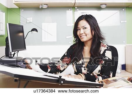 Picture - Portrait of a businesswoman smiling. Fotosearch