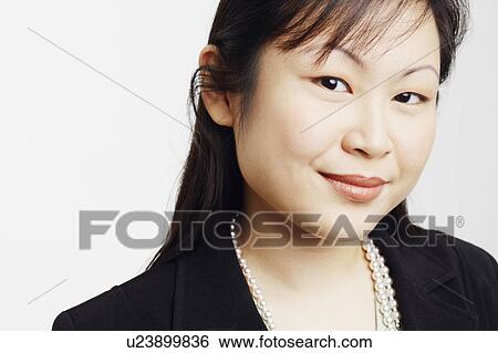Portrait of a businesswoman smiling View Large Photo Image Stock Photograph - Portrait of a businesswoman smiling. Fotosearch
