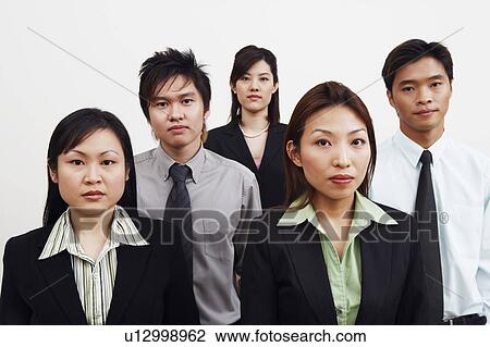Portrait of three businesswomen standing with two businessmen View Large Photo Image Stock Image - Portrait of three businesswomen standing with two businessmen. Fotosearch