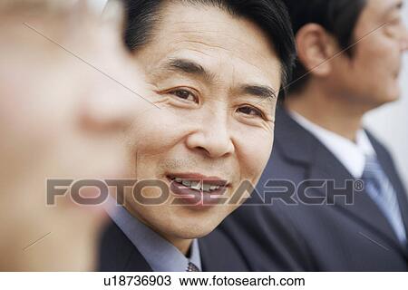 Stock Image - Portrait of two businessmen. Fotosearch