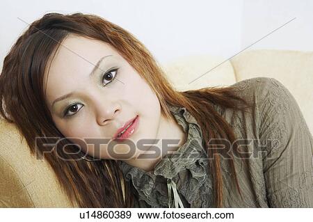 Close-up of a young woman View Large Photo Image Stock Photo - Close-up of a young woman. Fotosearch