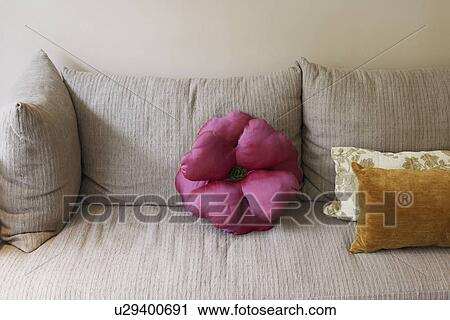 Stock Image - Cushions on a couch. Fotosearch