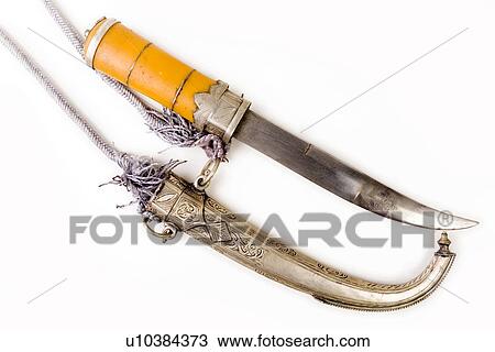 Stock Image - dagger, daggers, Freigestellte, Freisteller, Krummdolch, marokkanisch, marokkanische. Fotosearch