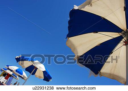 Stock Photo - sunshade, seating, circulare, colored, lobby, travel destinations, seascape. Fotosearch