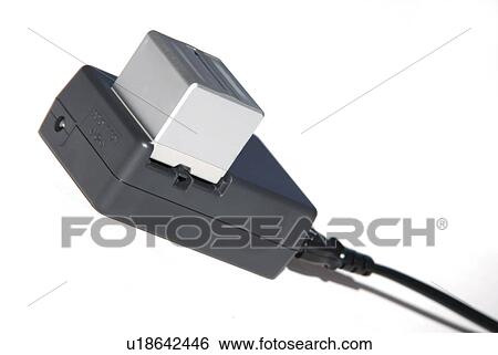 Stock Photograph - reserve, Akku-Ladegerät, battery charger, capacity, camcorder, technology, accumulator. Fotosearch