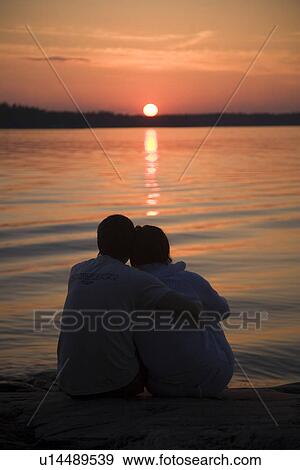 Stock Photo - camaraderie, affectionate, buddy, buddies, affections, caring, affection. Fotosearch