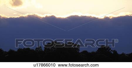 clouds, back light, calf, burgenland, baumsilhouette, glow, austria View Large Photo Image Stock Image - clouds, back light, calf, burgenland, baumsilhouette, glow, austria. Fotosearch