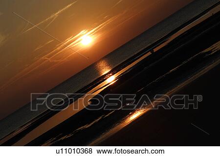 evening, back light, ebb, diagonal, beach, evening atmosphere, afterglows View Large Photo Image Stock Photo - evening, back light, ebb, diagonal, beach, evening atmosphere, afterglows. Fotosearch