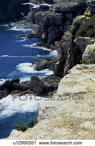 Bluffs by water View Large Photo Image Stock Image - Bluffs by water. Fotosearch