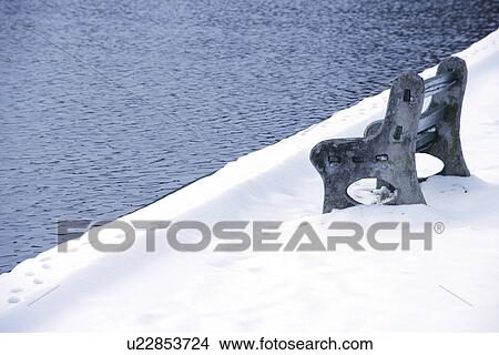 A bench in the snow View Large Photo Image Picture - A bench in the snow. Fotosearch