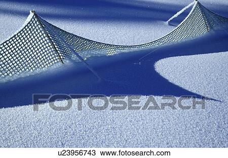 A fence in the snow View Large Photo Image Stock Image - A fence in the snow. Fotosearch