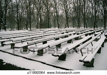 Picture - winter, snow, snowy spring, april, city park, riga, latvia. Fotosearch