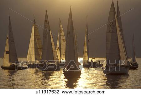 Stock Image - segelmast, abenddaemmerung, boat, boats, brown, dusk, evening light. Fotosearch