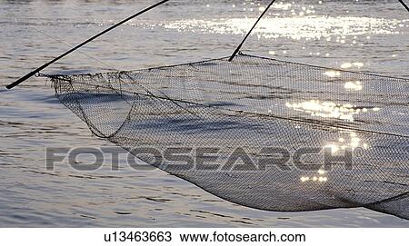 fishing boat, calf, fishing, evening light, Danube, fishing net, austria View Large Photo Image Stock Image - fishing boat, calf, fishing, evening light, Danube, fishing net, austria. Fotosearch