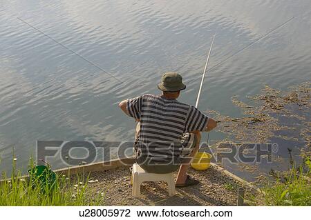 Stock Image - fishing rod, fish, angling rod, fishing-rod, sport fishing, angler, endurance. Fotosearch