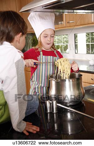Children cooking spaghetti View Large Photo Image Stock Image - Children cooking spaghetti. Fotosearch