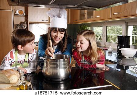 Children cooking View Large Photo Image Stock Photography - Children cooking. Fotosearch